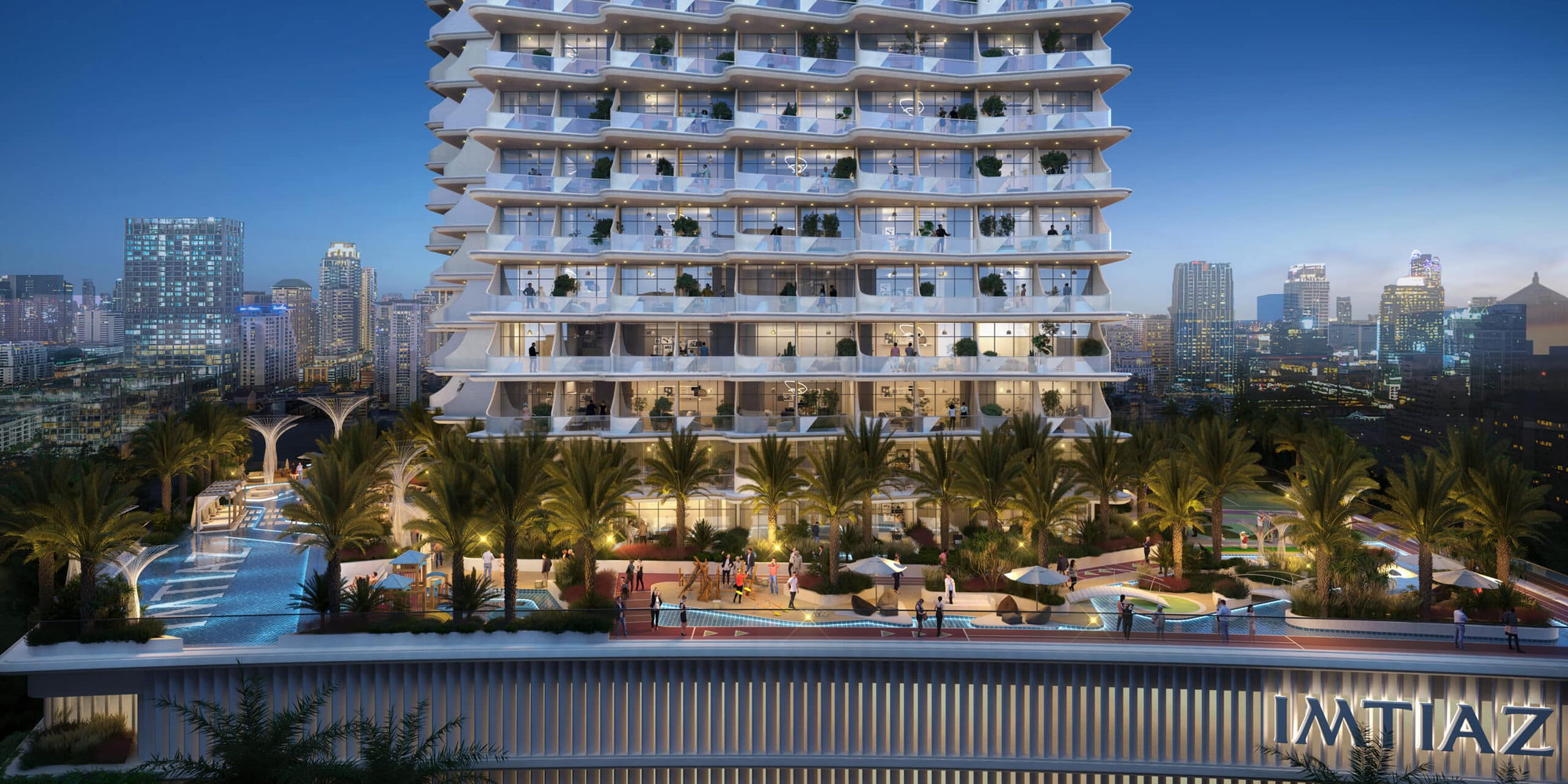 אימטיאז קוב” (IMTIAZ COVE) הוא מגדל מודרני הכולל מרפסות וגינות גג שופעות, המוקפות בעצי דקל, בריכות ואנשים המבלים בנחת, והכל על רקע קו הרקיע העירוני בשעת בין ערביים. השם “אימטיאז” בולט על חזית הבניין. אימטיאז קוב" (IMTIAZ COVE) הוא מגדל מודרני הכולל מרפסות וגינות גג שופעות, המוקפות בעצי דקל, בריכות ואנשים המבלים בנחת, והכל על רקע קו הרקיע העירוני בשעת בין ערביים. השם "אימטיאז" בולט על חזית הבניין.