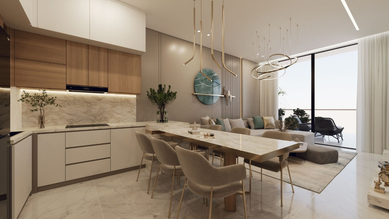 מטבח וסלון מודרניים בתכנון פתוח במלון Samana Miami, הכוללים גוונים ניטרליים, משטחי שיש, כיסאות בצבע בז’, גופי תאורה מוזהבים, שעון קיר גדול בצבע טורקיז וחלונות מהרצפה עד התקרה המכניסים אור טבעי. מטבח וסלון מודרניים בתכנון פתוח במלון Samana Miami, הכוללים גוונים ניטרליים, משטחי שיש, כיסאות בצבע בז', גופי תאורה מוזהבים, שעון קיר גדול בצבע טורקיז וחלונות מהרצפה עד התקרה המכניסים אור טבעי.