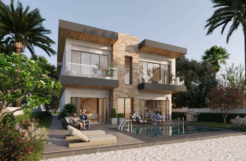 בית מודרני בן שתי קומות עם חזית מאבן וזכוכית, מרפסות ובריכה בחזיתו, המשקף את אורח החיים התוסס של “דמאק לגונס קוסטה בראבה”. האורחים נרגעים על מיטות שיזוף לצד הבריכה, בין עצי דקל וצמחייה עבותה, תחת שמיים בהירים. בית מודרני בן שתי קומות עם חזית מאבן וזכוכית, מרפסות ובריכה בחזיתו, המשקף את אורח החיים התוסס של "דמאק לגונס קוסטה בראבה". האורחים נרגעים על מיטות שיזוף לצד הבריכה, בין עצי דקל וצמחייה עבותה, תחת שמיים בהירים.