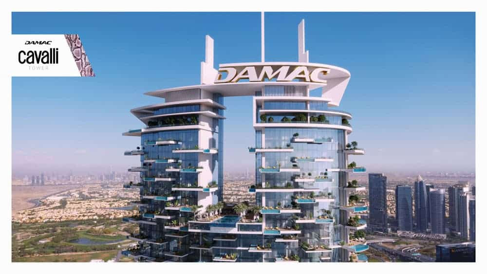 בניין רב-קומות מודרני עם שלט ענק של DAMAC על הגג ומרפסות רבות, בעל חזית זכוכית אלגנטית. הבניין, הנושא את לוגו מגדל קוואלי, בולט בנוף הנדל”ן של דובאי ומבטיח דירות יוקרה בלעדיות. בניין רב-קומות מודרני עם שלט ענק של DAMAC על הגג ומרפסות רבות, בעל חזית זכוכית אלגנטית. הבניין, הנושא את לוגו מגדל קוואלי, בולט בנוף הנדל"ן של דובאי ומבטיח דירות יוקרה בלעדיות.