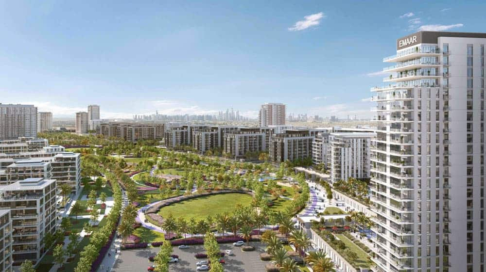 נוף עירוני מודרני באזור דובאי הילס אסטייט, שבו בנייני דירות רבי קומות ובניינים בינוניים מקיפים פארק ירוק ורחב ידיים, עם עצי דקל, שבילים ומגדלי העיר הנראים מרחוק תחת שמיים כחולים וצלולים. נוף עירוני מודרני באזור דובאי הילס אסטייט, שבו בנייני דירות רבי קומות ובניינים בינוניים מקיפים פארק ירוק ורחב ידיים, עם עצי דקל, שבילים ומגדלי העיר הנראים מרחוק תחת שמיים כחולים וצלולים.