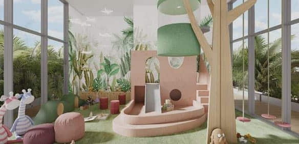 Современная крытая игровая комната в Ellington House, Dubai Hills, с большими окнами, игровым оборудованием пастельных тонов, небольшой горкой, мягкой зоной отдыха, пушистыми игрушками-жирафами и дизайном, вдохновленным растениями, создает светлое, вдохновленное природой пространство для детей.