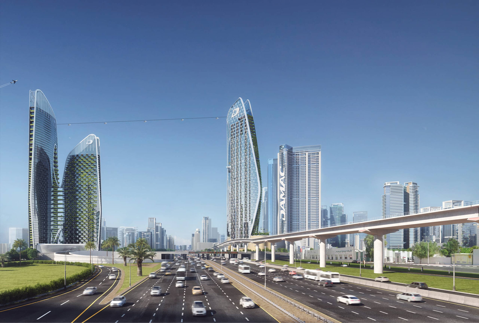 כביש מהיר רב-מסלולי ועמוס חוצה נוף עירוני מודרני, שבו נישאים גורדי שחקים גבוהים ועתידניים מזכוכית, בהם מבנים הנושאים את השם DAMAC, ומסילת רכבת חד-מסלולית הנעה במקביל לכביש תחת שמיים כחולים וצלולים. כביש מהיר רב-מסלולי ועמוס חוצה נוף עירוני מודרני, שבו נישאים גורדי שחקים גבוהים ועתידניים מזכוכית, בהם מבנים הנושאים את השם DAMAC, ומסילת רכבת חד-מסלולית הנעה במקביל לכביש תחת שמיים כחולים וצלולים.