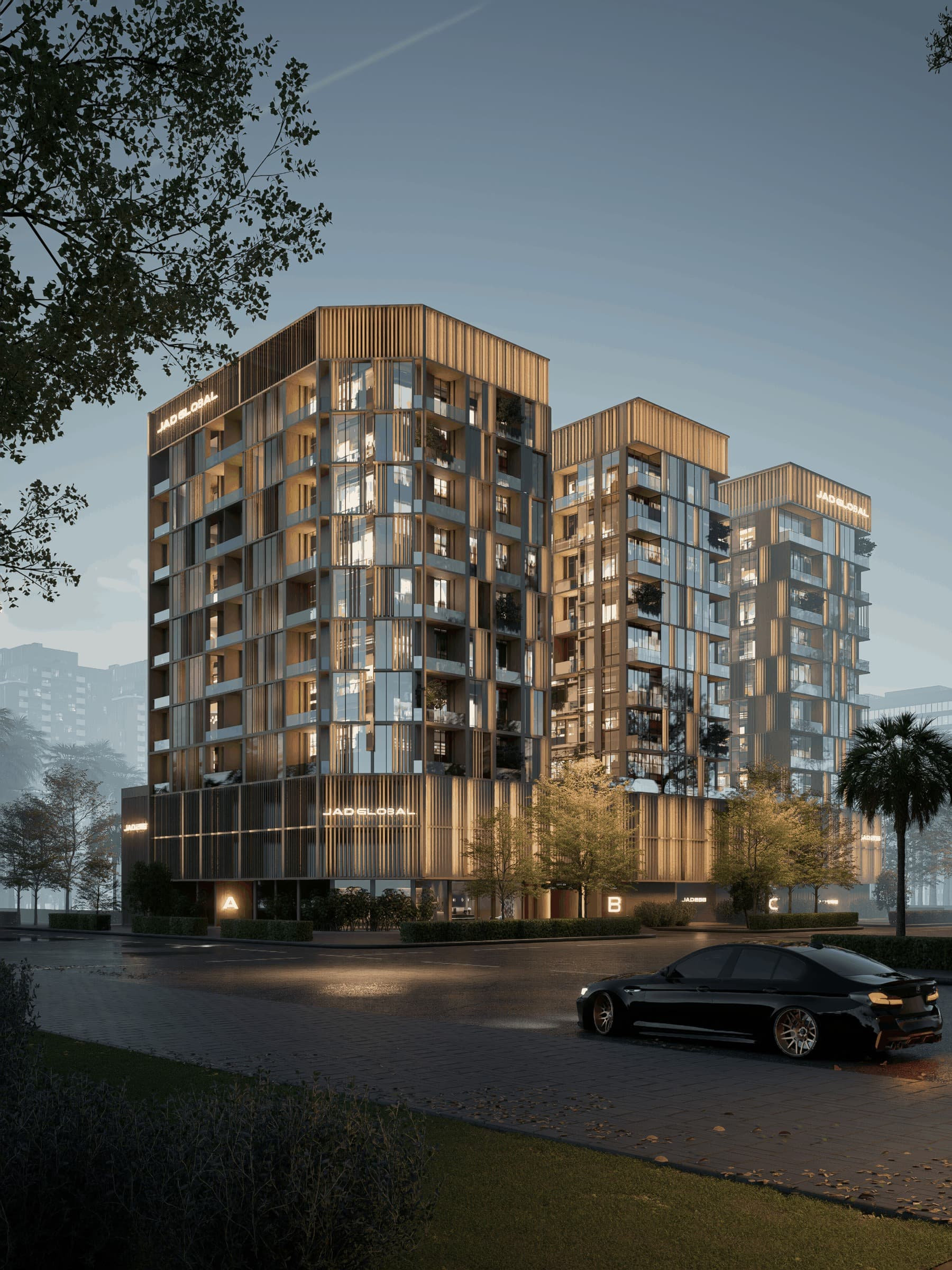 בנייני דירות מודרניים בני מספר קומות מוארים בשעת בין ערביים, ואור חם בוקע מהחלונות. מכונית שחורה חונה לפניהם, מוקפת בעצים ובגינון, ברחוב רטוב ומבריק. בנייני דירות מודרניים בני מספר קומות מוארים בשעת בין ערביים, ואור חם בוקע מהחלונות. מכונית שחורה חונה לפניהם, מוקפת בעצים ובגינון, ברחוב רטוב ומבריק.