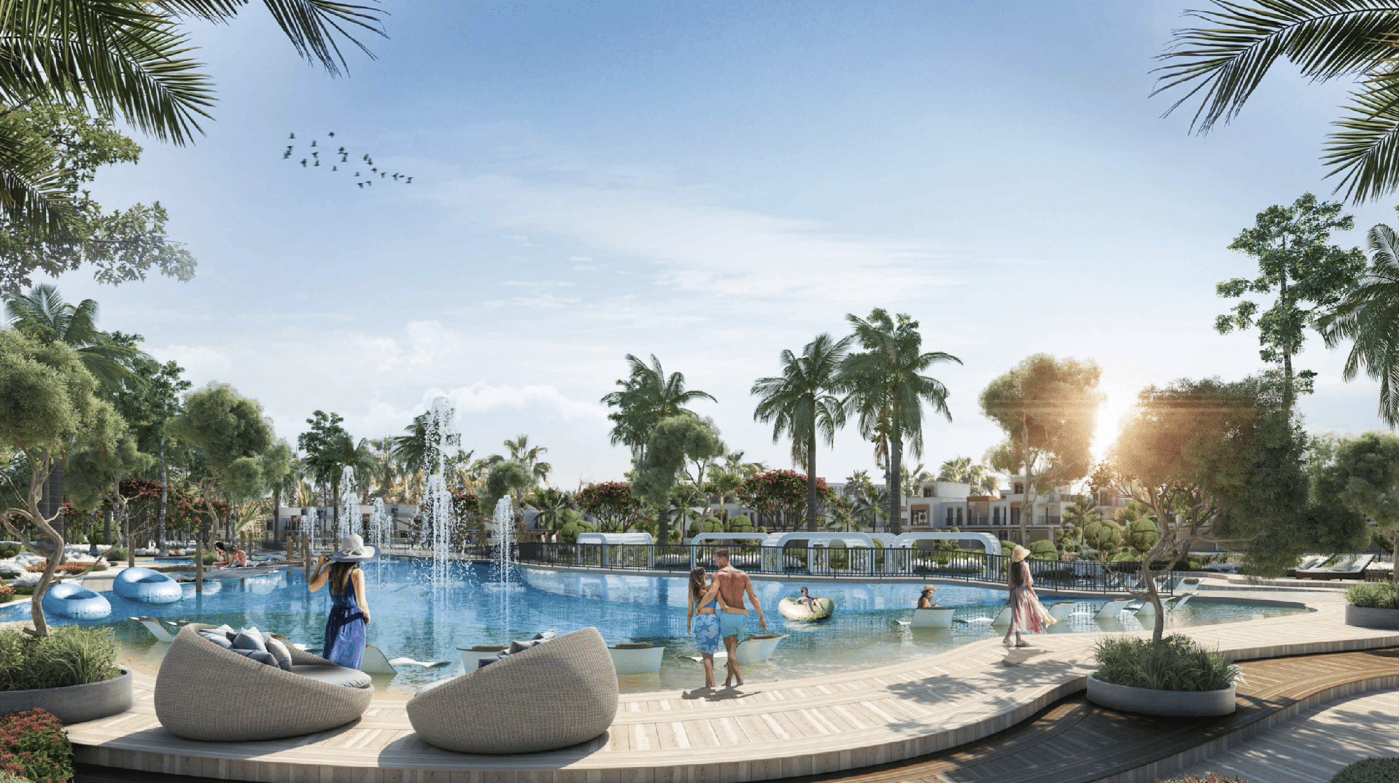 אזור הבריכה בסגנון אתר נופש ב-Damac Lagoons כולל מזרקות, אנשים שמבלים ושוחים, מוקפים בעצי דקל וצמחייה תחת שמיים כחולים וצלולים. פינות ישיבה נעימות ומצופים מתנפחים בבריכה משדרים את האווירה הנינוחה של מיקונוס. אזור הבריכה בסגנון אתר נופש ב-Damac Lagoons כולל מזרקות, אנשים שמבלים ושוחים, מוקפים בעצי דקל וצמחייה תחת שמיים כחולים וצלולים. פינות ישיבה נעימות ומצופים מתנפחים בבריכה משדרים את האווירה הנינוחה של מיקונוס.