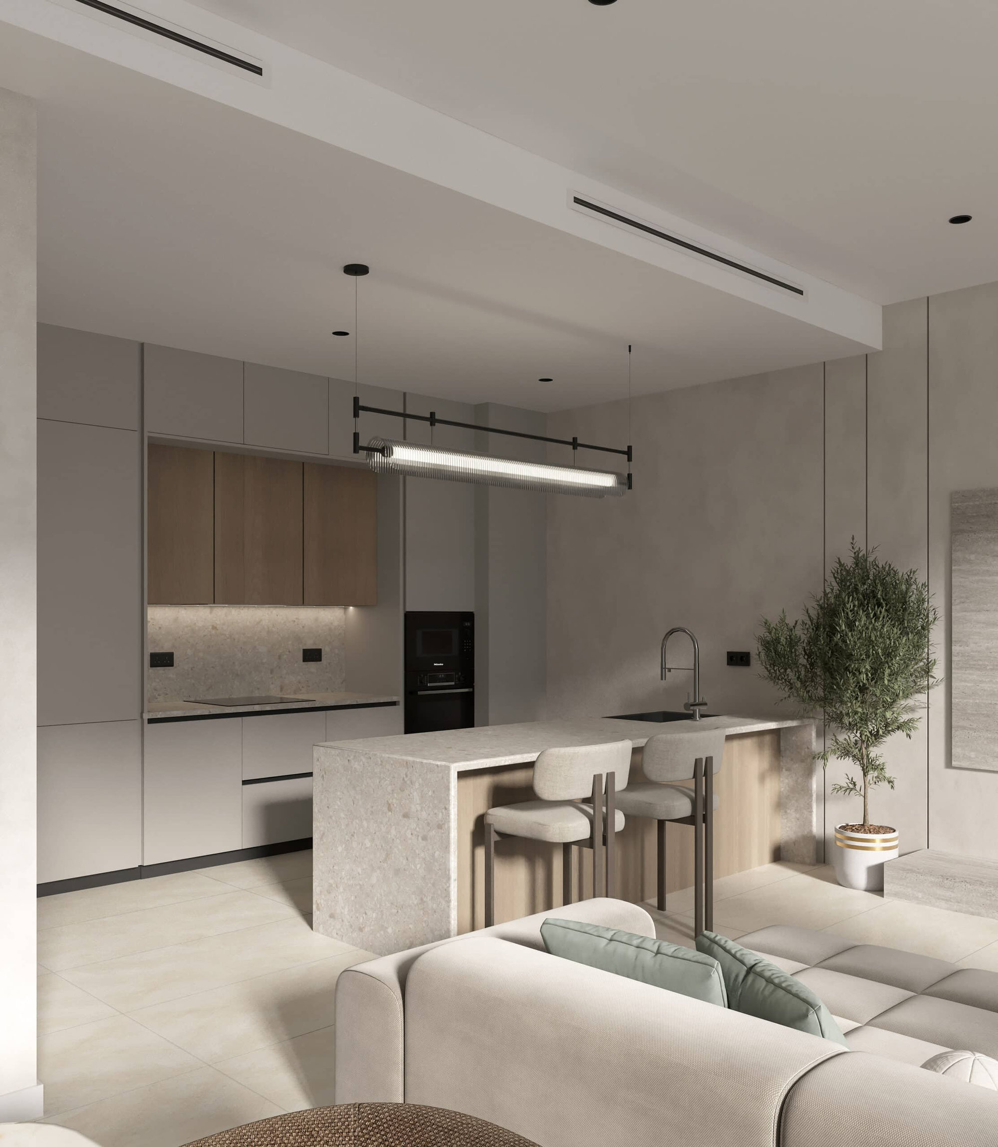 מטבח מודרני ומינימליסטי ב-LIV OCEANSIDE, עם ארונות בצבע אפור בהיר, תנור מובנה ואי אבן עם שני כסאות בר. ליד האי ניצב צמח ביתי, וברקע נראית חלקית פינת ישיבה נעימה. מטבח מודרני ומינימליסטי ב-LIV OCEANSIDE, עם ארונות בצבע אפור בהיר, תנור מובנה ואי אבן עם שני כסאות בר. ליד האי ניצב צמח ביתי, וברקע נראית חלקית פינת ישיבה נעימה.