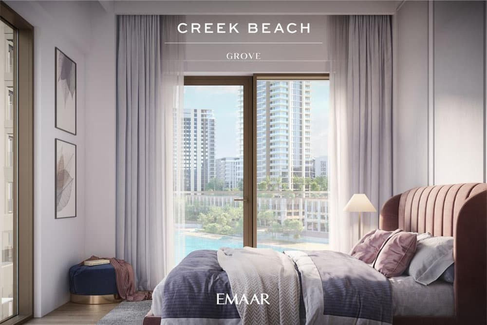 חדר שינה מודרני במלון Creek Beach Grove, עם חלון גדול המשקיף על בניינים גבוהים ובריכה בחוץ. בחדר מיטה מסודרת בקפידה, תמונות קיר מסוגננות ושידת לילה עם מנורה. על הכיתוב נכתב “Creek Beach Grove” ו-“Emaar”. חדר שינה מודרני במלון Creek Beach Grove, עם חלון גדול המשקיף על בניינים גבוהים ובריכה בחוץ. בחדר מיטה מסודרת בקפידה, תמונות קיר מסוגננות ושידת לילה עם מנורה. על הכיתוב נכתב "Creek Beach Grove" ו-"Emaar".