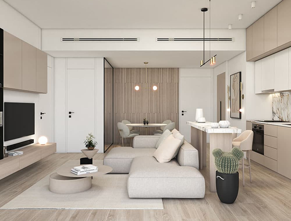 חלל מגורים מודרני בתכנון פתוח בפרויקט Noor Midtown, במרכז דובאי, בגוונים ניטרליים, הכולל ספה מודולרית בצבע אפור בהיר, טלוויזיה המותקנת על הקיר, שולחן קפה עגול ופינת אוכל. מימין ניצב מטבח מינימליסטי מבית Deyaar. חלל מגורים מודרני בתכנון פתוח בפרויקט Noor Midtown, במרכז דובאי, בגוונים ניטרליים, הכולל ספה מודולרית בצבע אפור בהיר, טלוויזיה המותקנת על הקיר, שולחן קפה עגול ופינת אוכל. מימין ניצב מטבח מינימליסטי מבית Deyaar.
