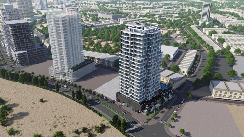 מבט אווירי על נוף עירוני מודרני הכולל בנייני דירות גבוהים, רחובות משובצים בעצים ושטח חול בקדמת התמונה. התמונה מציגה צמחייה עירונית, מבנים רבים בגובה בינוני, ובולט ביניהם מתחם המגורים “Catch Residences”. מבט אווירי על נוף עירוני מודרני הכולל בנייני דירות גבוהים, רחובות משובצים בעצים ושטח חול בקדמת התמונה. התמונה מציגה צמחייה עירונית, מבנים רבים בגובה בינוני, ובולט ביניהם מתחם המגורים "Catch Residences".