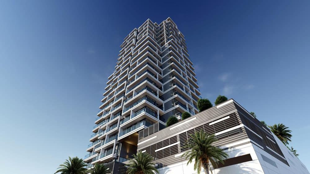 פרויקט “Catch Residences” מציע בניין דירות מודרני רב-קומתי עם מרפסות בכל קומה, הנשקף מלמטה על רקע שמיים כחולים וצלולים, ומוקף בעצי דקל וצמחייה עבותה בבסיסו. פרויקט "Catch Residences" מציע בניין דירות מודרני רב-קומתי עם מרפסות בכל קומה, הנשקף מלמטה על רקע שמיים כחולים וצלולים, ומוקף בעצי דקל וצמחייה עבותה בבסיסו.