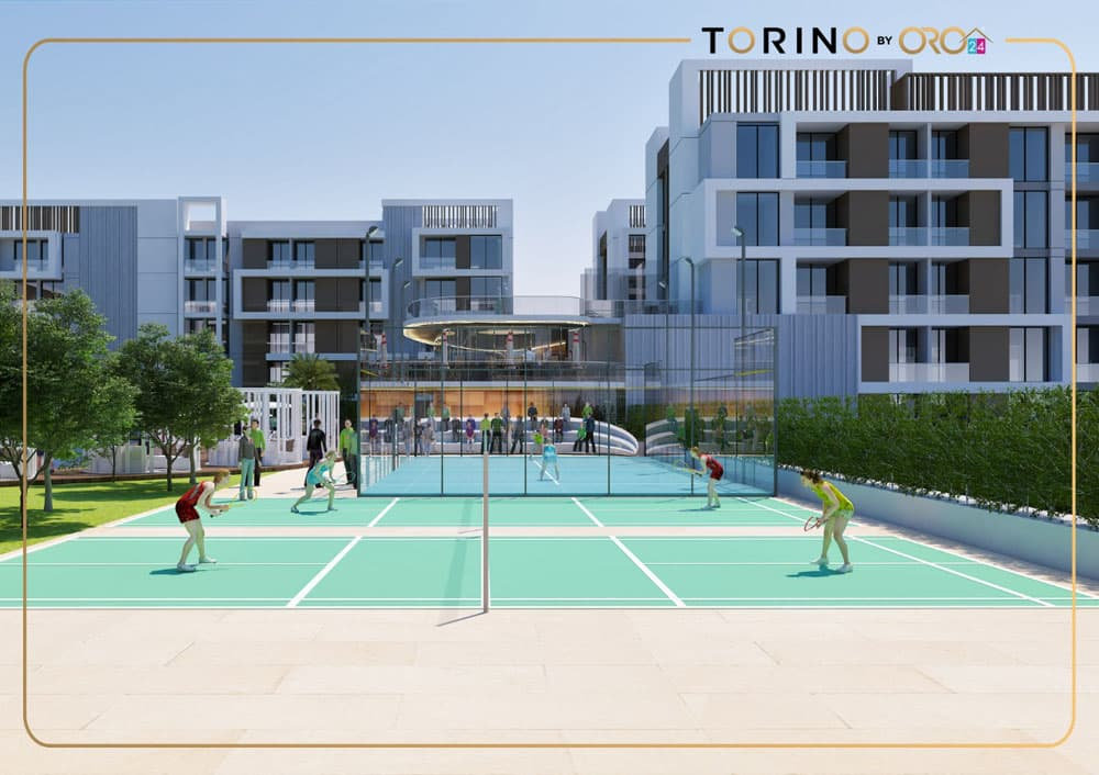 אנשים משחקים בדמינטון במגרש חיצוני בפרויקט “טורינו” של ORO24, המוקף בבנייני דירות מודרניים, צמחייה ומבנה קהילתי בעל קירות זכוכית. הסצנה השטופת שמש משדרת חיוניות בסביבה העירונית העכשווית הזו. אנשים משחקים בדמינטון במגרש חיצוני בפרויקט "טורינו" של ORO24, המוקף בבנייני דירות מודרניים, צמחייה ומבנה קהילתי בעל קירות זכוכית. הסצנה השטופת שמש משדרת חיוניות בסביבה העירונית העכשווית הזו.